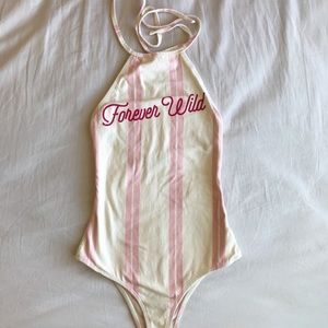 pink and white striped bodysuit